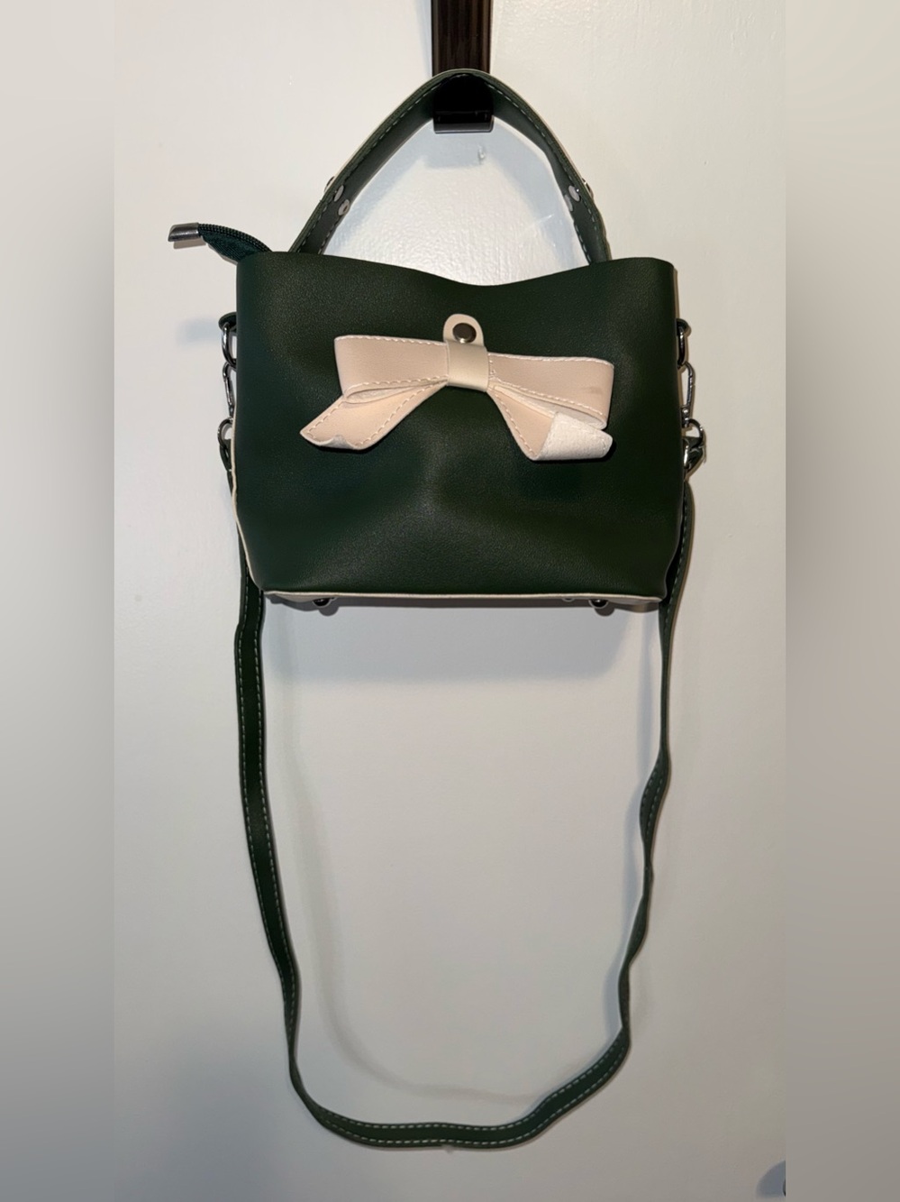 NWOT Dark Green Crossbody Bag with Cream Bow Accent by